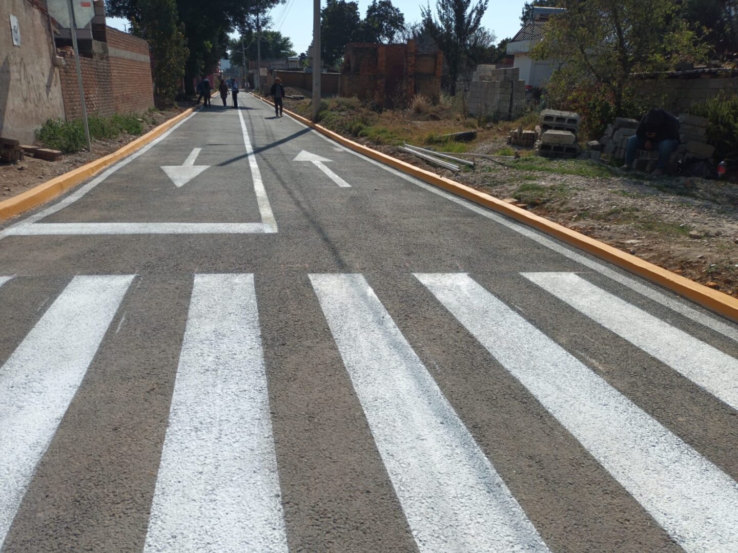 «Nuestros niños no volverán a ensuciarse para llegar a la escuela»: vecino de la calle 4 Norte en San Juan Tlautla