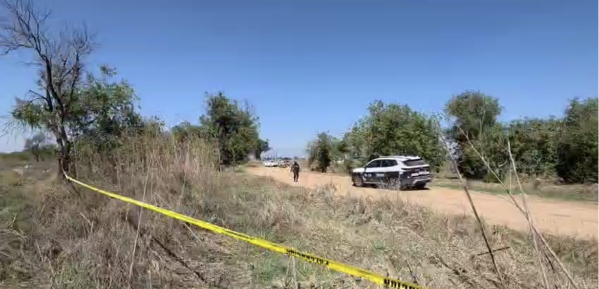 Localizan cadáver embolsado en campos de cultivo de Coronango